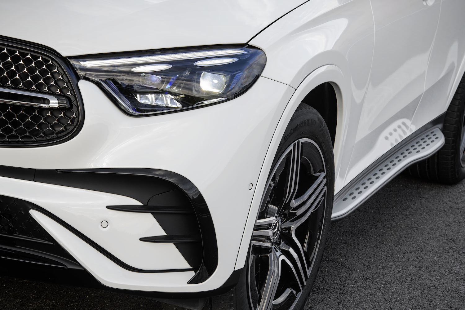 Front end close up of 2023 Mercedes-Benz GLC's headlights.