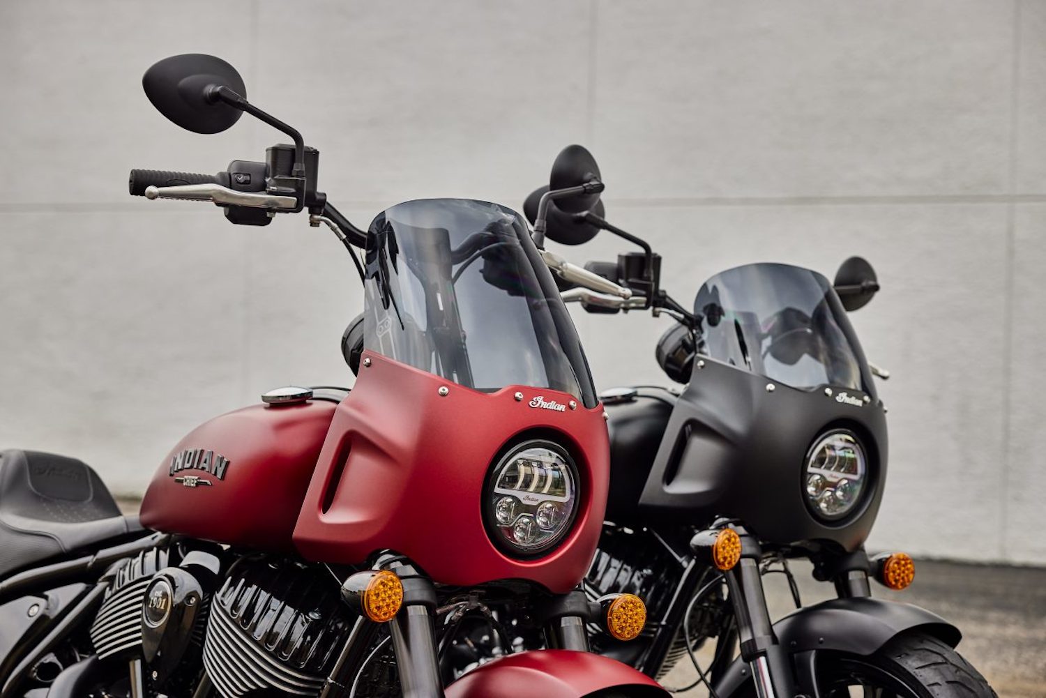 Close up of front ends on the 2023 Indian Sport Chief with different handlebar heights.