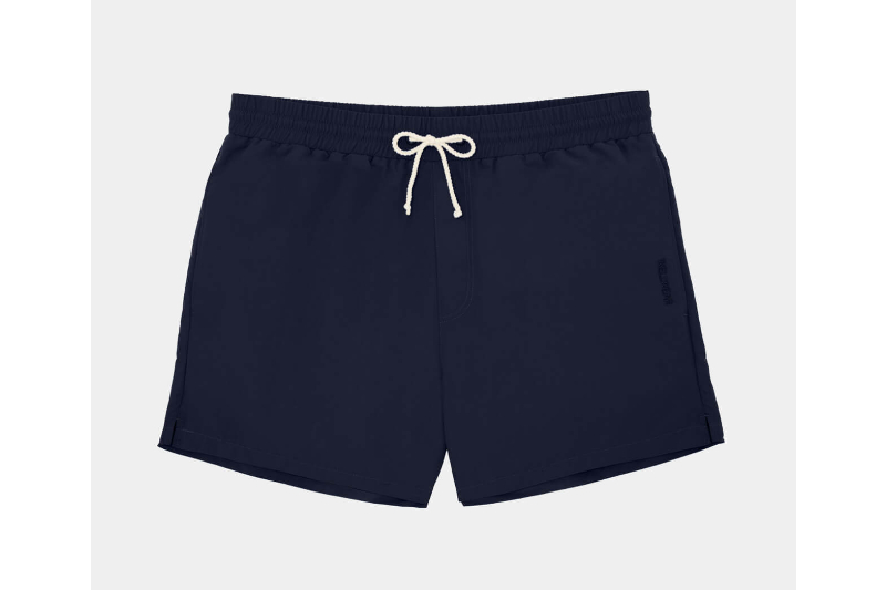 David Gandy swim trunks in navy on a light gray background.