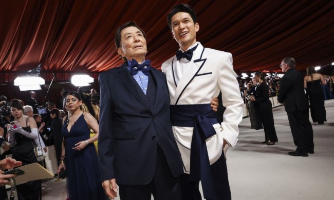 Harry Shum Jr. standing with James Hong wearing an eastern inspired tuxedo