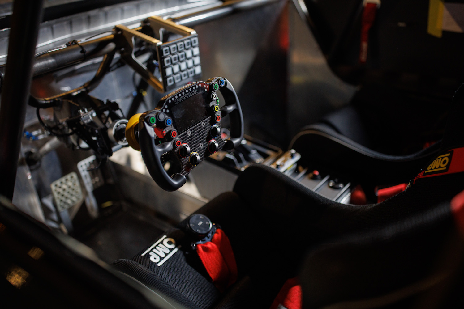 Close up view of the steering wheel and dashboard in the Honda CR-V Hybrid Racer.