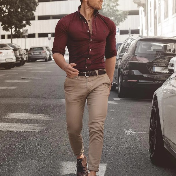 man wearing khakis with a red button up