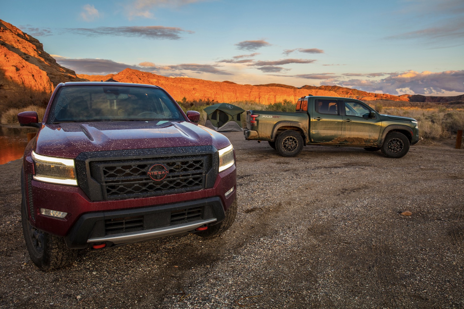 2022 Nissan Frontier Pro-4X front end angle and side profile in front of mountains.