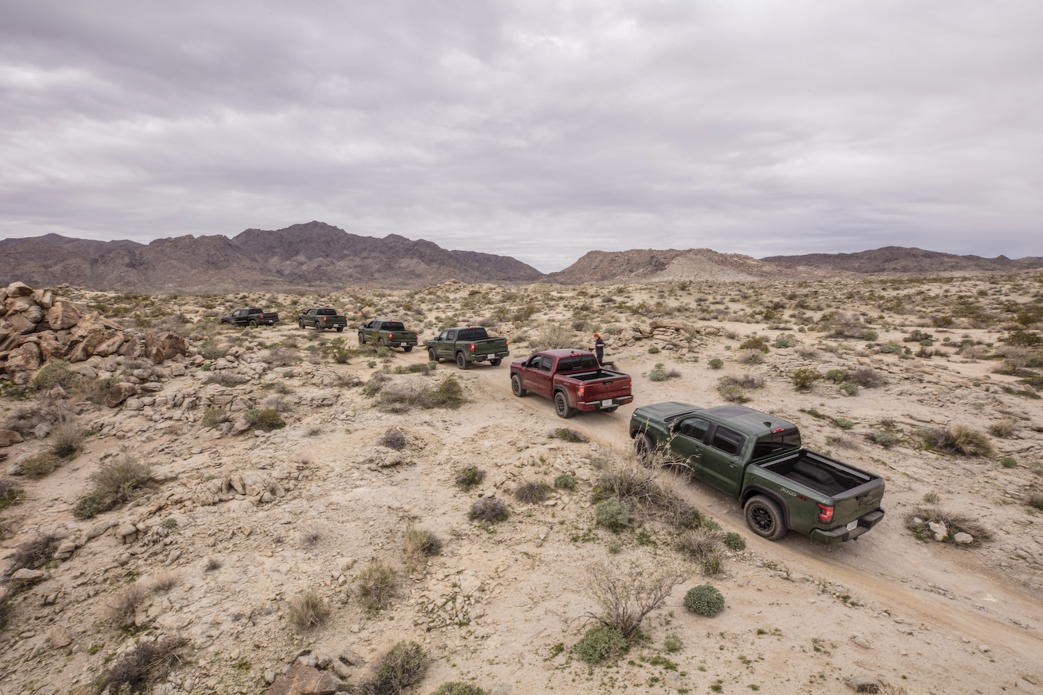 Rear end photo of the 2022 Nissan Frontier Pro-4X parked on a trail in the desert.