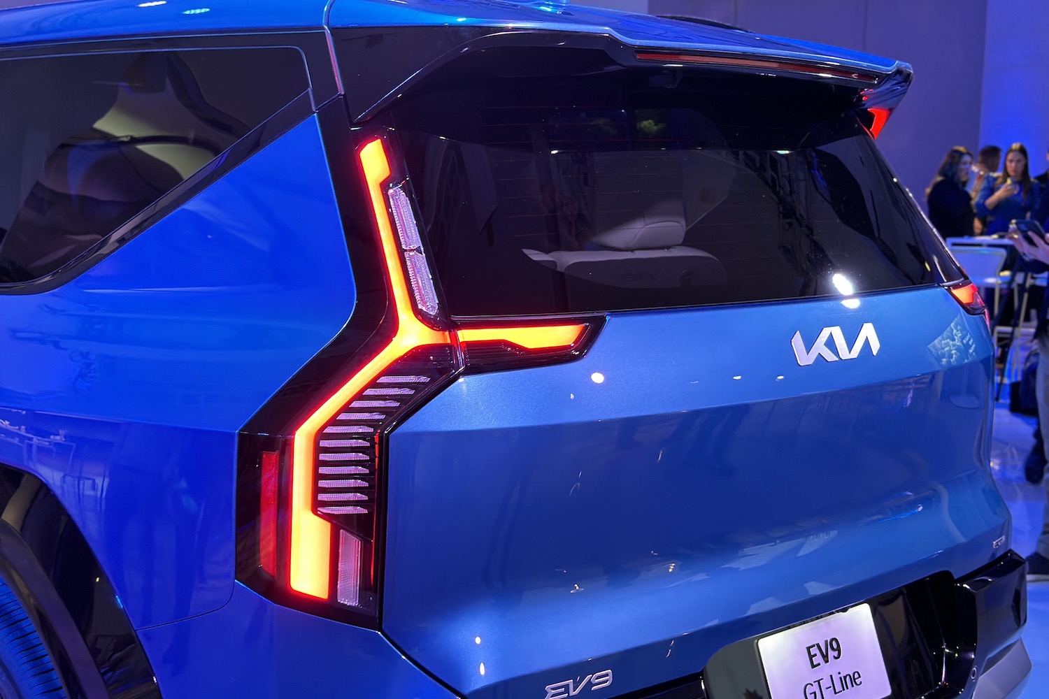 Close up of rear taillight on the 2024 Kia EV9 in a studio.