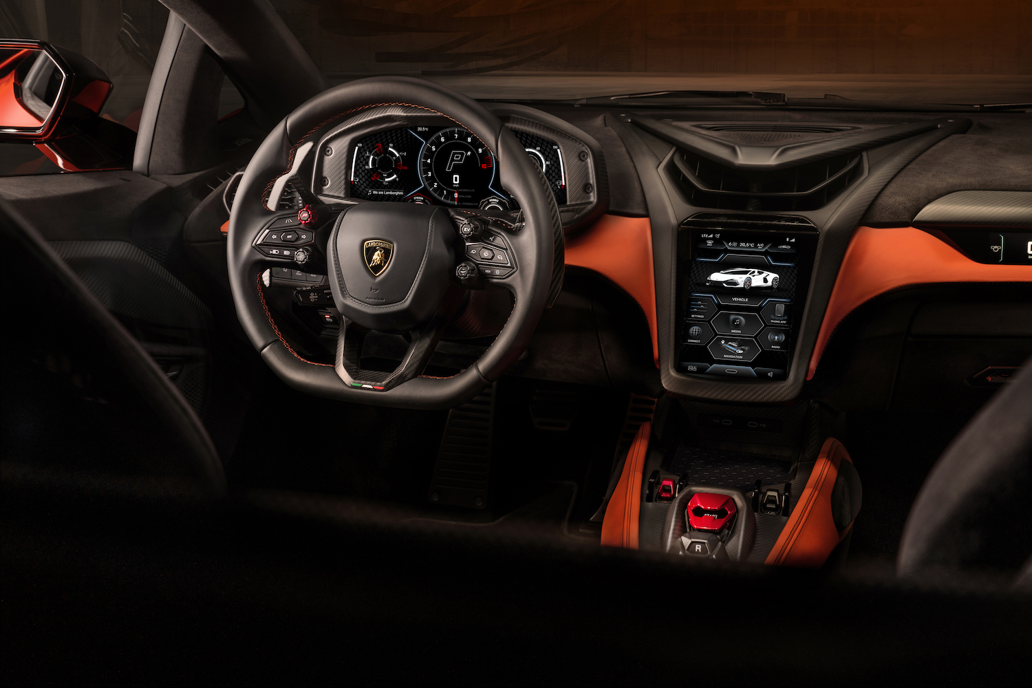 Close up of steering wheel and center console in the 2024 Lamborghini Revuelto.