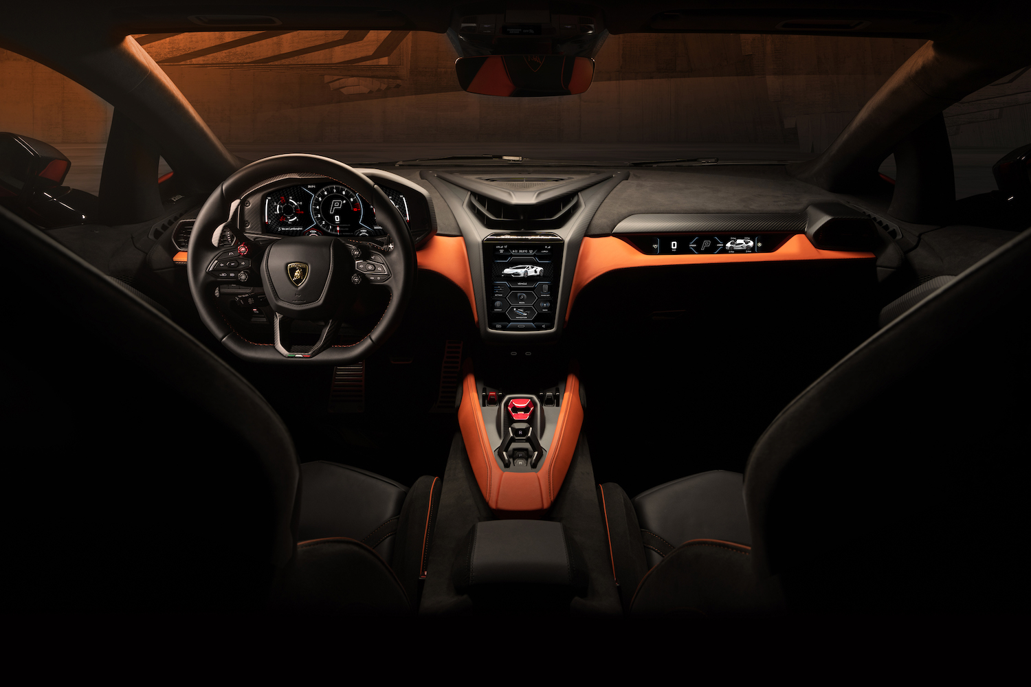 2024 Lamborghini Revuelto interior from behind front seats with mountains in the back.