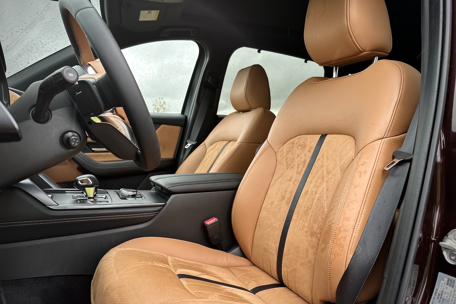 Front seats in the 2024 Mazda CX-90 from outside the SUV.