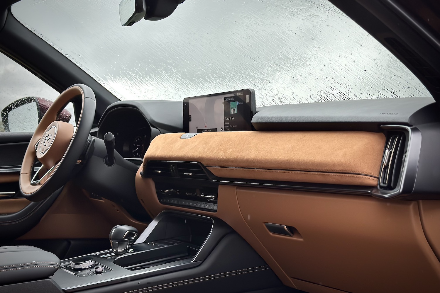 Close up of dashboard in the 2024 Mazda CX-90 from the passenger side of the SUV.