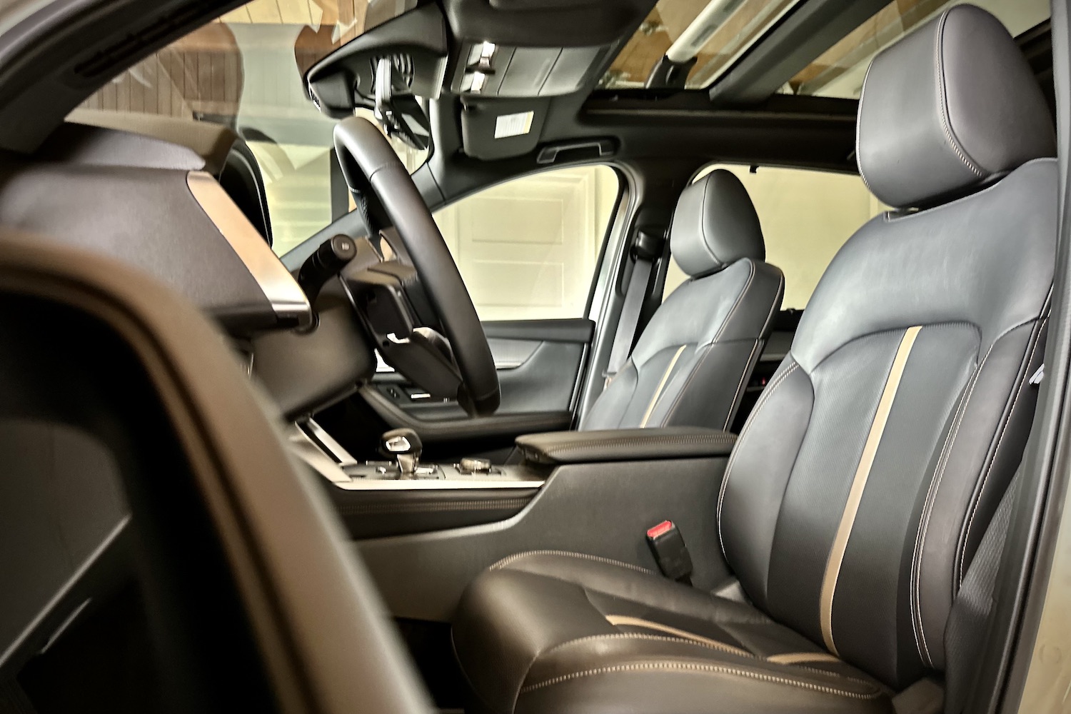 Front seats in the 2024 Mazda CX-90 PHEV from the driver's side.