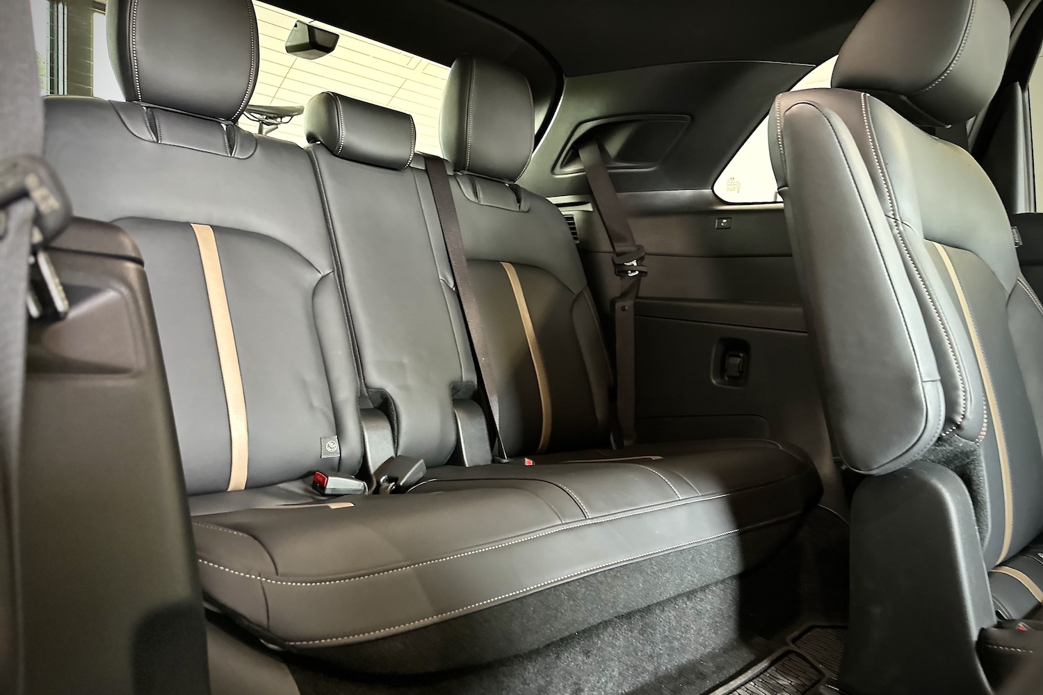 Third-row seats in the 2024 Mazda CX-90 PHEV from the second row.
