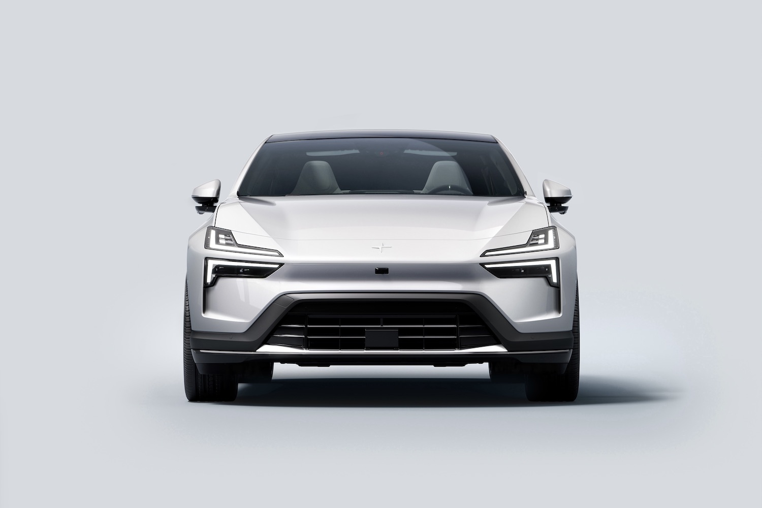 Close up of front end of the 2025 Polestar 4 in front of a white background.