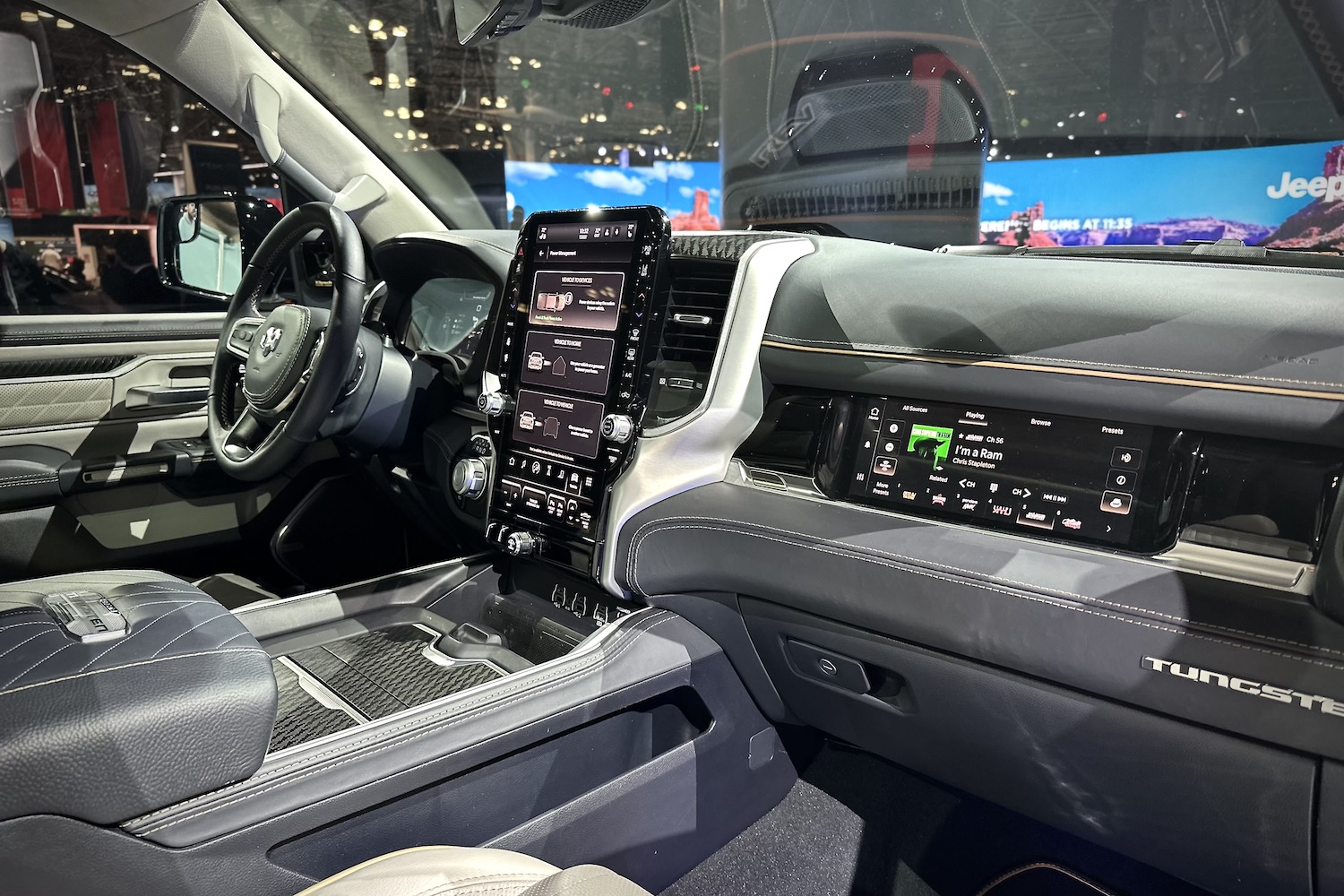 Close up dashboard on the 2025 Ram 1500 REV from the passenger's side.