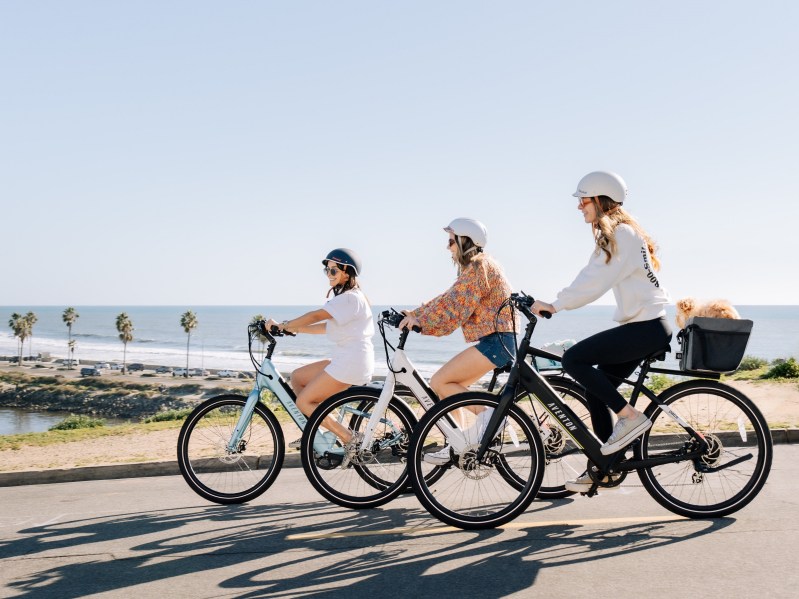 Aventon Pace_500_3 ebike on the road with riders having fun.
