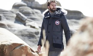A man wearing a Canada Goose parka jacket
