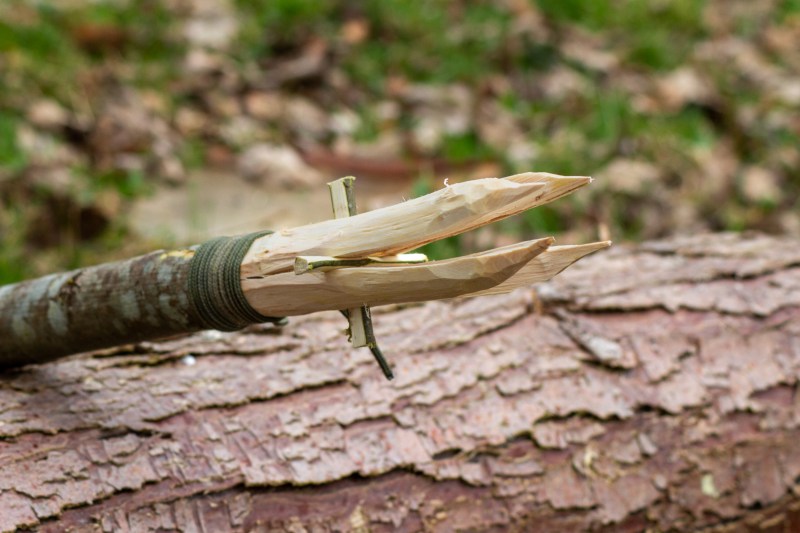 A survival spear with four prongs