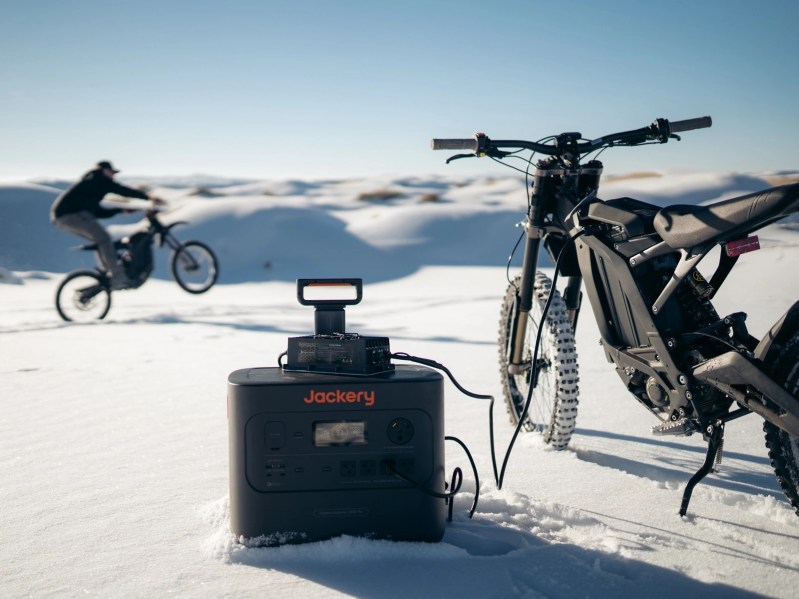 Jackery-Solar-Generator-Pro-used-while-skiing and biking in background.