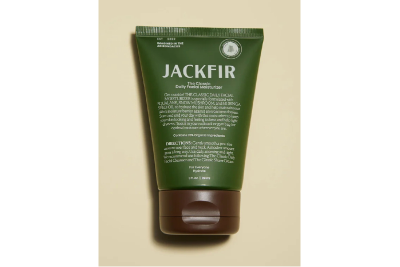 Jackfir daily moisturizer product on a beige background.