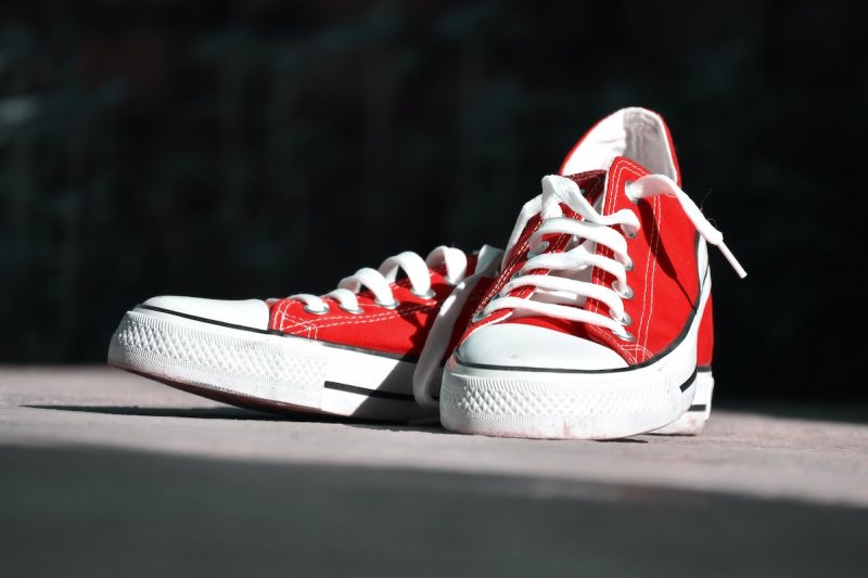 red canvas low top sneakers