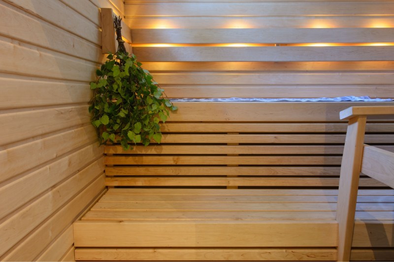 Birch vihta hanging in a Finnish sauna.