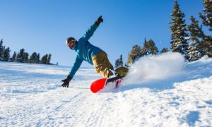 Snowboarder with orange board