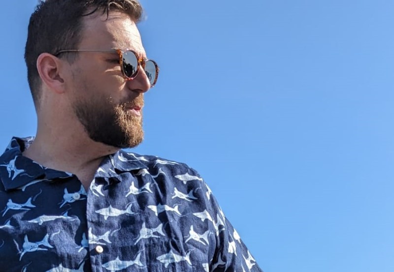 Man in UNTUCKit x David Hart shirt and glasses