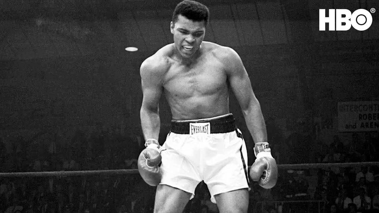 Muhammad Ali in the boxing ring in black and white. 