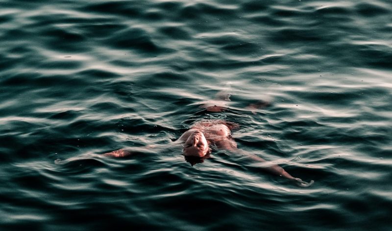 Man swimming in the ocean