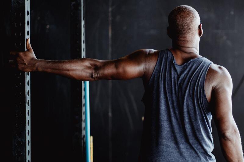 Man stretching his chest