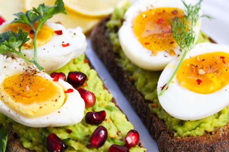 Eggs on avocado toast.