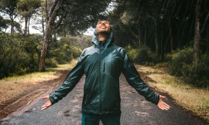 Man in a waterproof jacket in the rain
