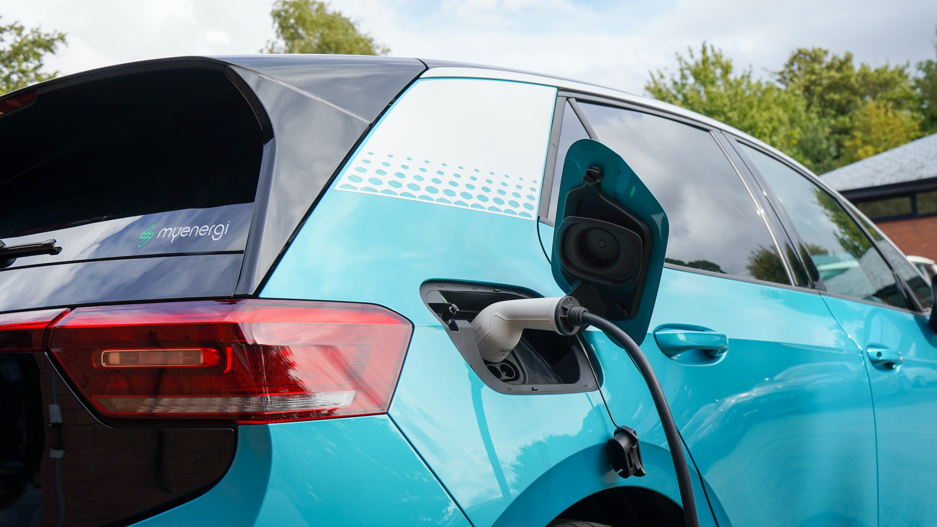 An electric vehicle being charged.