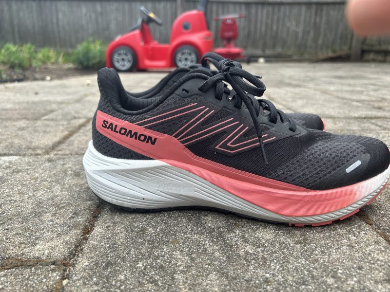 Salomon running shoe on the ground