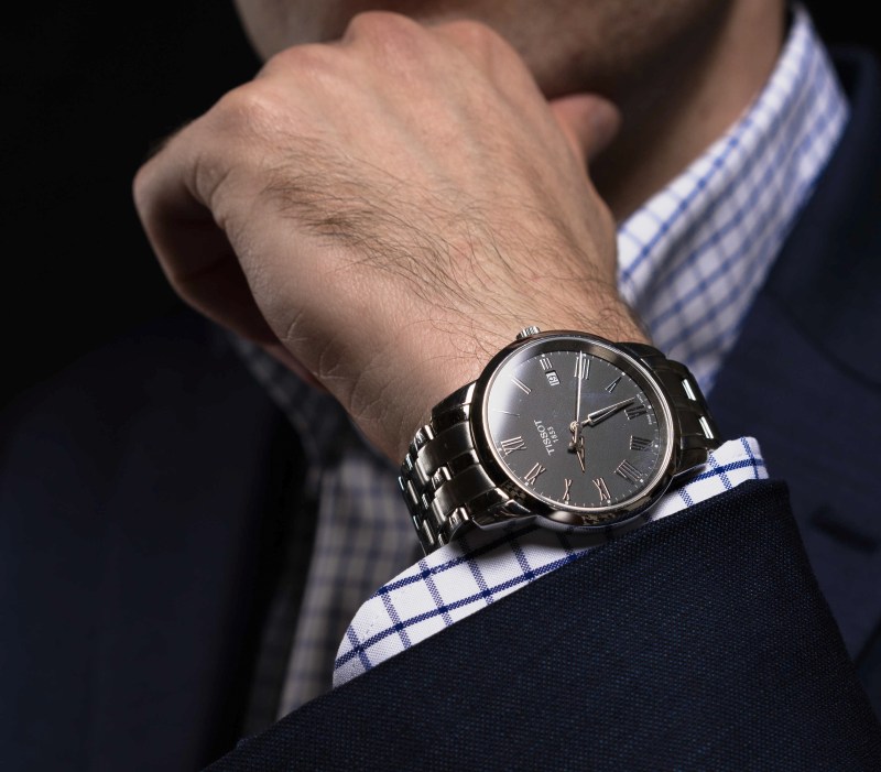 Man wearing Tissot watch
