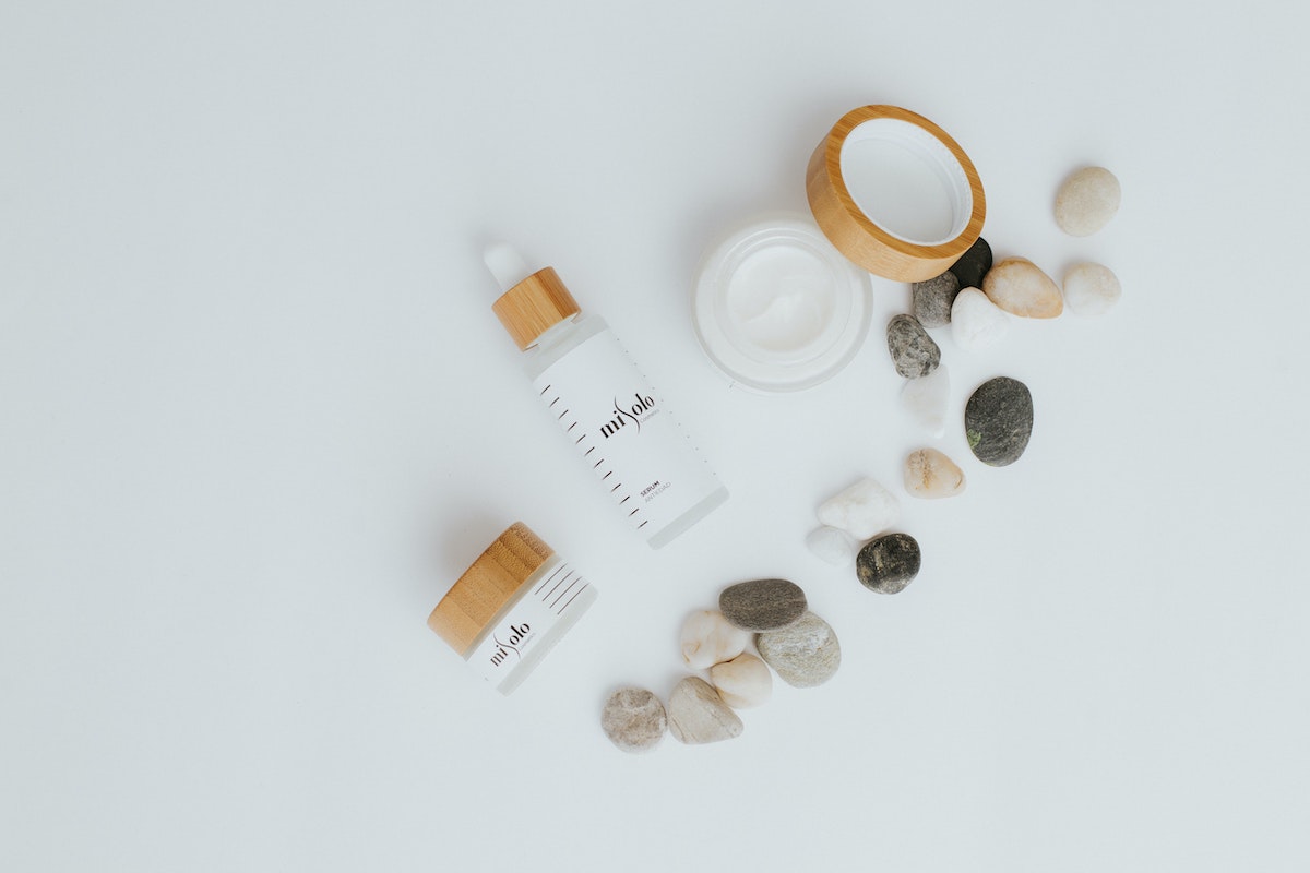 a flatlay of skincare products on white background