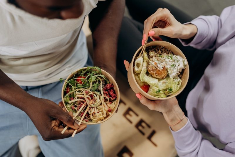 Man and woman eating healthy