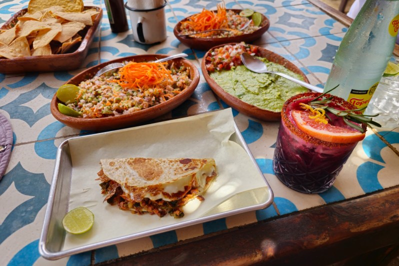 A table full of food at Barracuda Cantina at Playa Los Cerritos, Baja California Sur, Mexico.