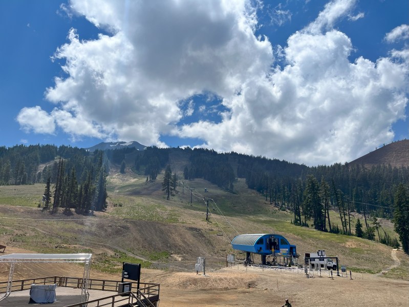 An empty chair lift line on a weekday at Bachelor Bike Park