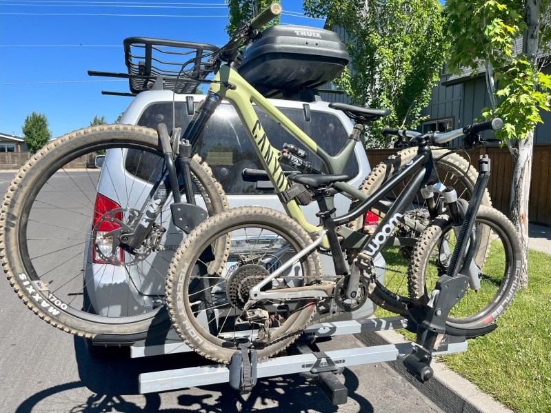 Two bikes secured on a hitch-style bike rack