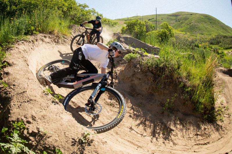 Two mountain bikers hitting the trails on the new F+B 30 AM wheelset