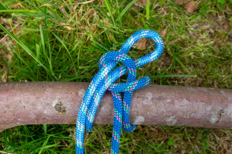 Step three of tying a highwayman's hitch.