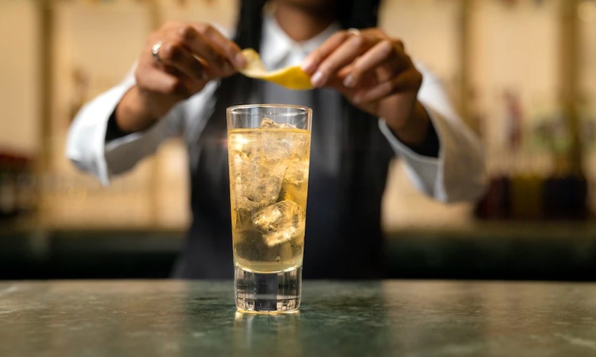 Bartender making a whiskey highball