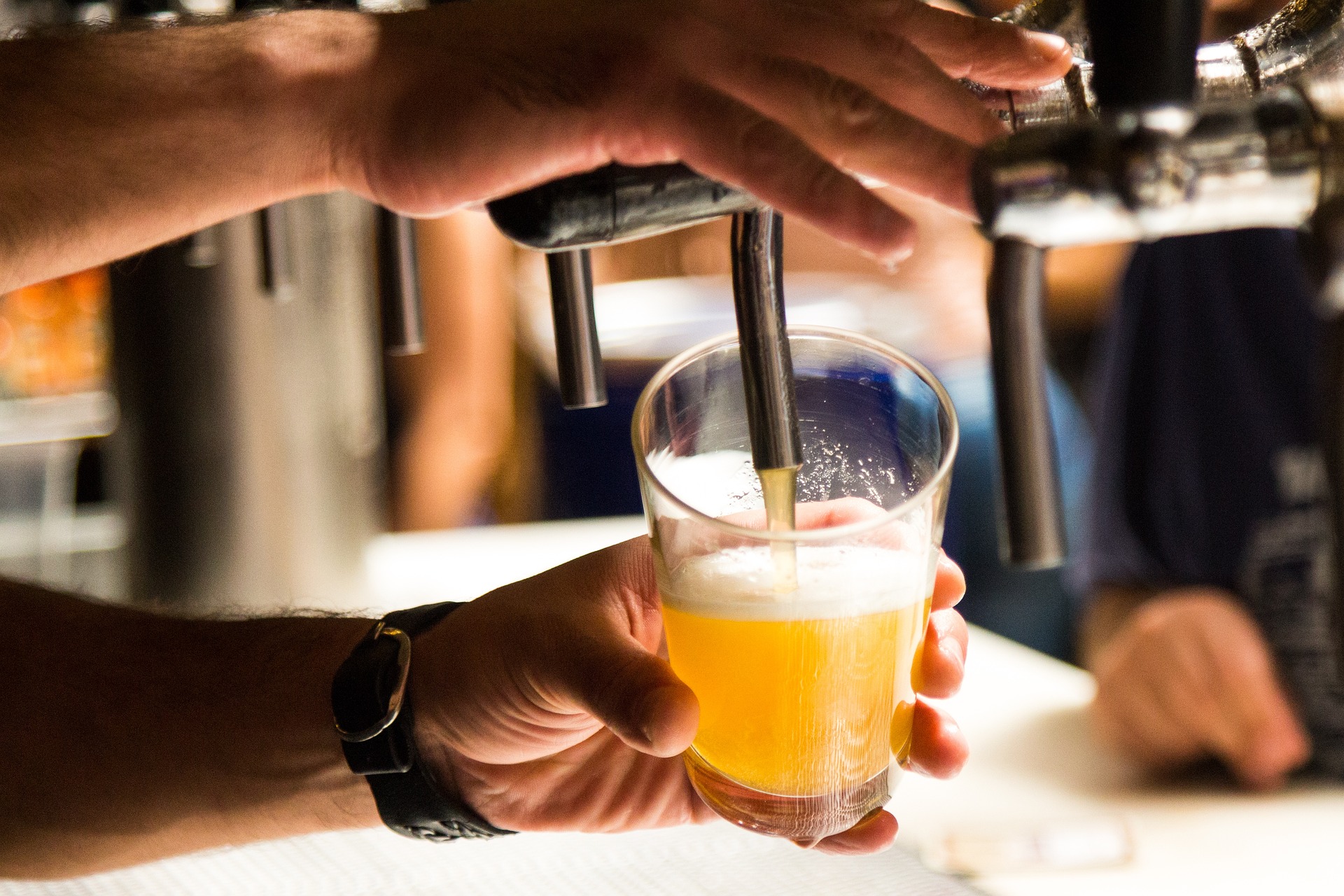 Beer being poured from tap