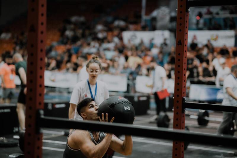 Man using a medicine ball.