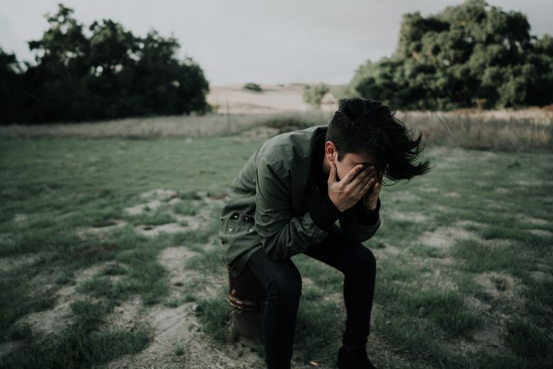 Man is sick on hiking trail