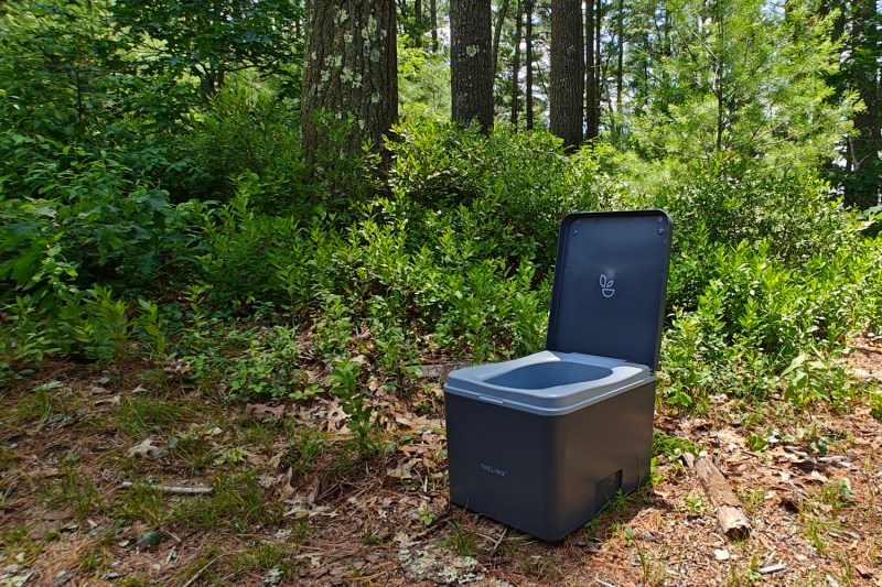 Trelino Evo S portable composting toilet in the woods.