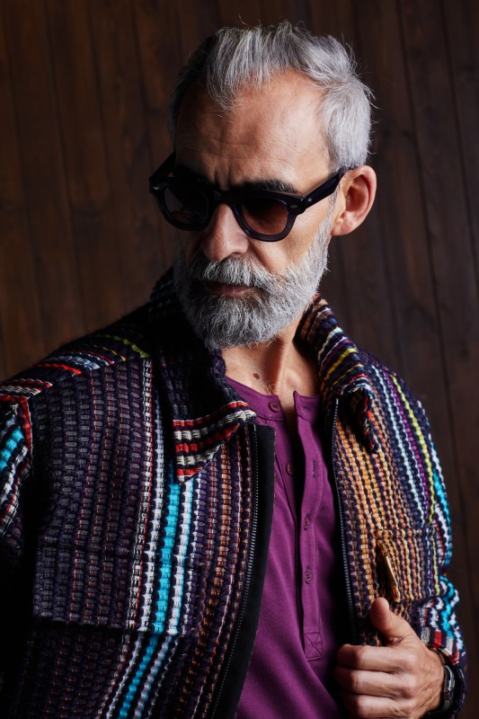 Bearded man in bright colored jacket