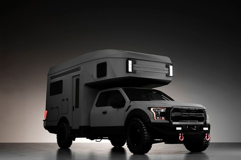 27North RexRover overlander camper truck against a glowing studio background.