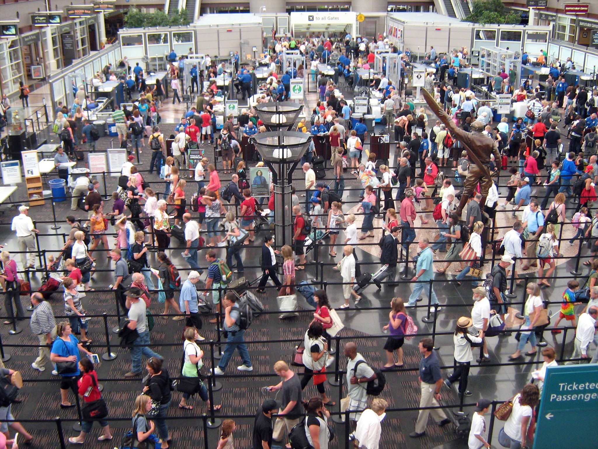 Hundreds of passengers waiting in airport security lines