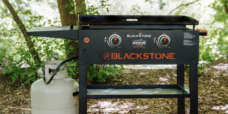 The Blackstone Adventure Ready 2-Burner 28-inch Griddle Cooking Station outside.,
